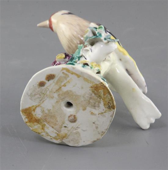 A Derby model of a goldfinch, c.1760-5, h.10cm, restored,